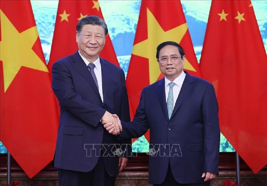 Thủ tướng Phạm Minh Chính và Tổng Bí thư, Chủ tịch nước Trung Quốc Tập Cận Bình chụp ảnh chung.
