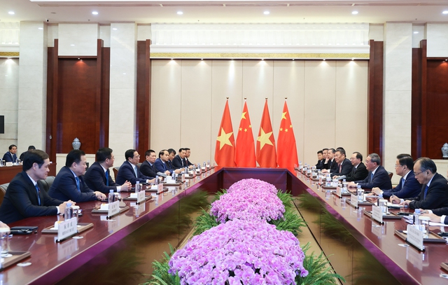 Hai Thủ tướng bày tỏ vui mừng và đánh giá cao những tiến triển trong quan hệ Việt - Trung thời gian qua - Ảnh: VGP/Nhật Bắc.